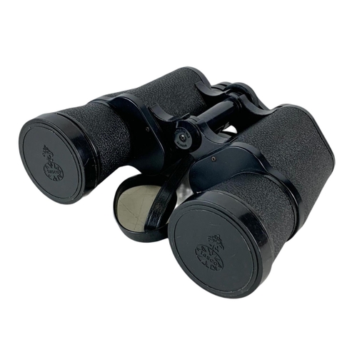 143 - Tasco binoculars in case. 20cm