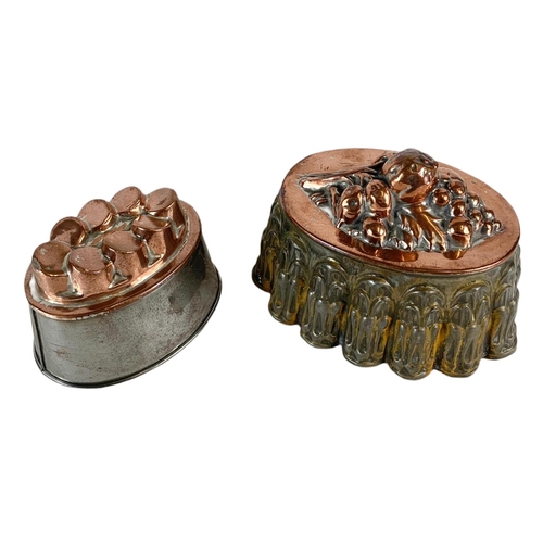 157 - 2 Victorian copper jelly moulds. 19/14cm