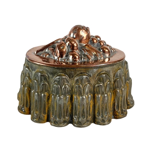 157 - 2 Victorian copper jelly moulds. 19/14cm