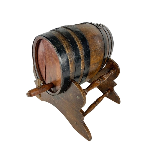 184 - Early 20th century barrel on stand. 45/45/41cm