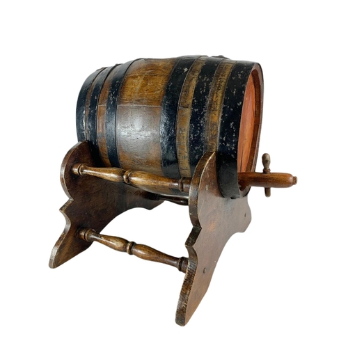 184 - Early 20th century barrel on stand. 45/45/41cm