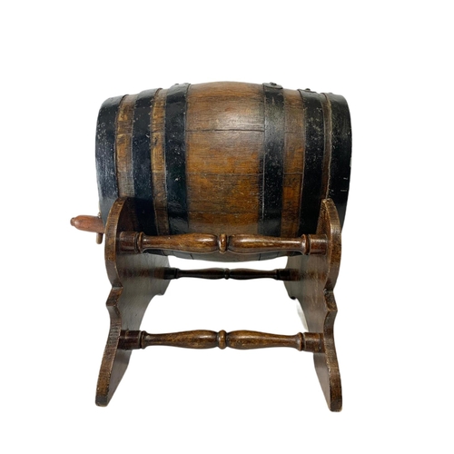 184 - Early 20th century barrel on stand. 45/45/41cm