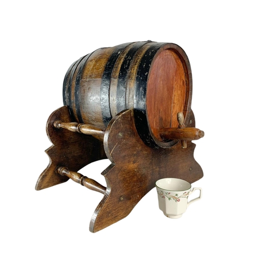 184 - Early 20th century barrel on stand. 45/45/41cm