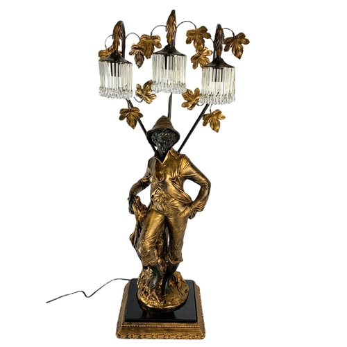 202 - Large ornate gilded lamp figure. 90cm