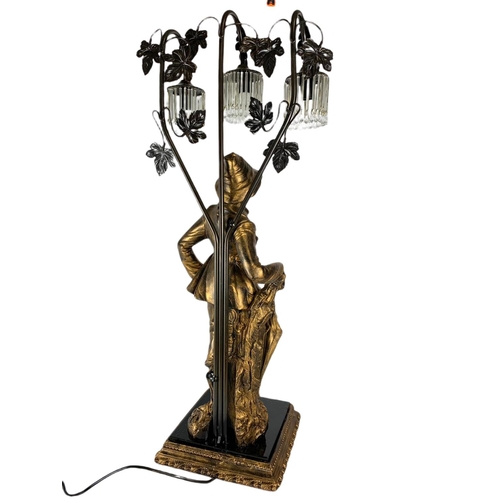 202 - Large ornate gilded lamp figure. 90cm