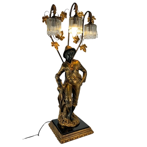 202 - Large ornate gilded lamp figure. 90cm