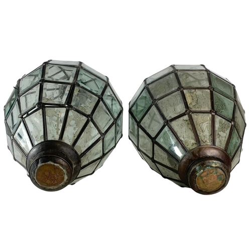 212 - Pair of large early 20th century copper candle holders. 73cm