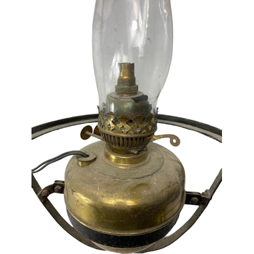 217 - 2 vintage brass oil lamps. 1 electrified. 61cm. 52cm