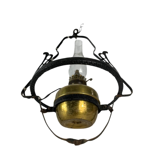 217 - 2 vintage brass oil lamps. 1 electrified. 61cm. 52cm