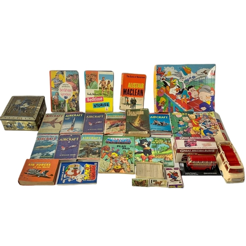 218 - Quantity of vintage books and games.