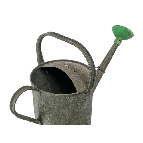 240 - Vintage galvanised watering can. 53/36cm