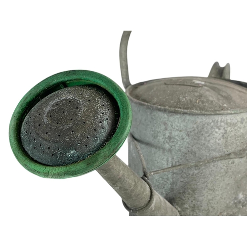 240 - Vintage galvanised watering can. 53/36cm