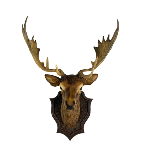 243 - Modern mounted stag head. Plastic. 44/60cm