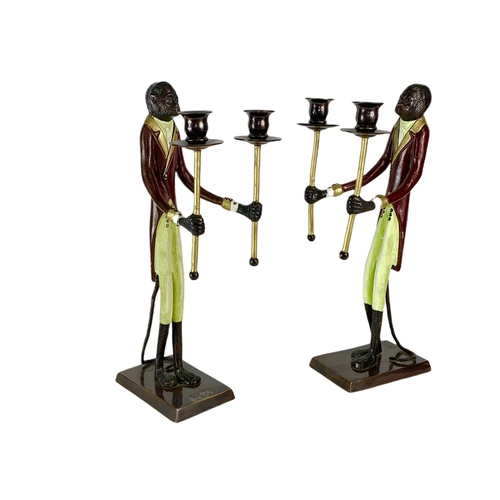 247 - Pair of tall Bronze monkey candlesticks. 41cm.