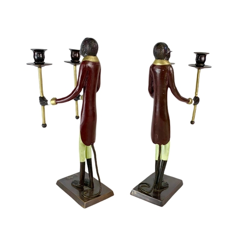 247 - Pair of tall Bronze monkey candlesticks. 41cm.