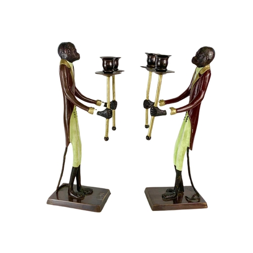 247 - Pair of tall Bronze monkey candlesticks. 41cm.