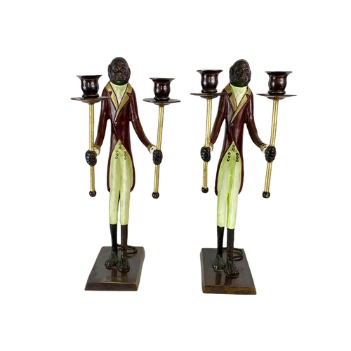 247 - Pair of tall Bronze monkey candlesticks. 41cm.