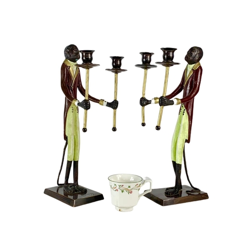 247 - Pair of tall Bronze monkey candlesticks. 41cm.