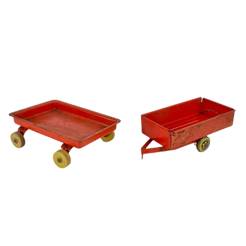 251 - Mettoy tin plate tipping trailer and another vintage tin plate trailer. 25.5cm