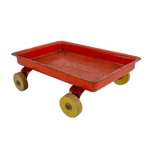 251 - Mettoy tin plate tipping trailer and another vintage tin plate trailer. 25.5cm