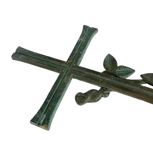 279 - 19th century bronze cross with flower decoration. 39.5cm