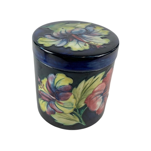 401 - Vintage Moorcroft jar with lid. 8.5/9cm.