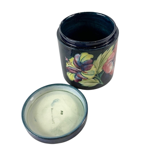 401 - Vintage Moorcroft jar with lid. 8.5/9cm.