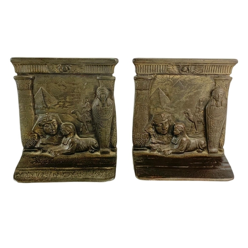 430 - 2 pairs of brass bookends. 14cm.