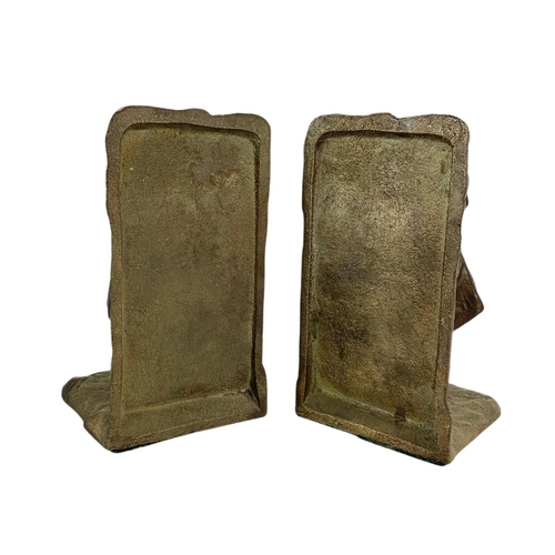 430 - 2 pairs of brass bookends. 14cm.