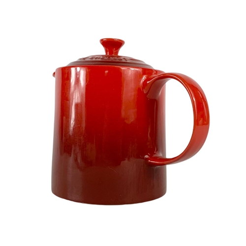 434 - Le Creuset pottery tea pot. 22/17.5cm