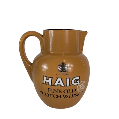 456 - Haig Fine Old Scotch Whisky water jug. By Carlton Ware. 15cm