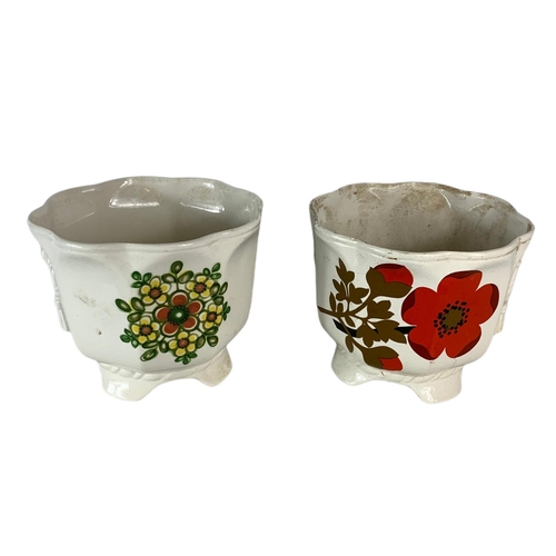 457 - 2 mid century pottery planters. 21/17cm