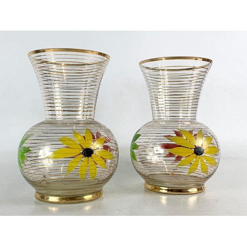 460 - Pair of 1960’s mid century glass vases. With gilding and hand painted flower decoration. 21.5cm