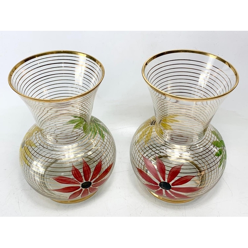 460 - Pair of 1960’s mid century glass vases. With gilding and hand painted flower decoration. 21.5cm