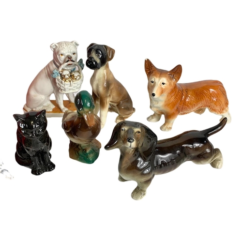 465 - Quantity of pottery animals, including Sylvac cat and Maling dog etc.