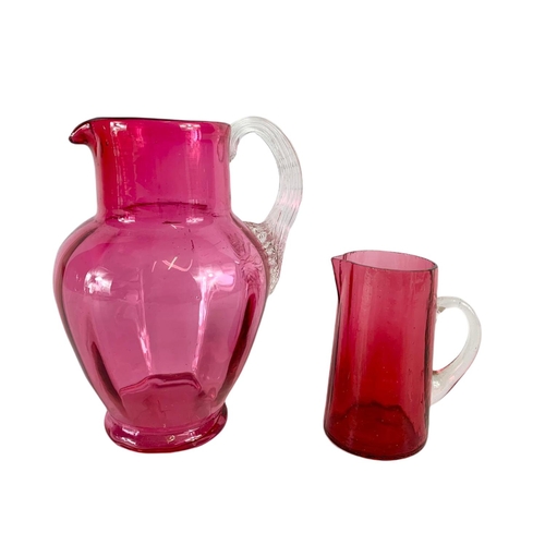 467 - 2 Victorian ruby glass jugs. 15cm