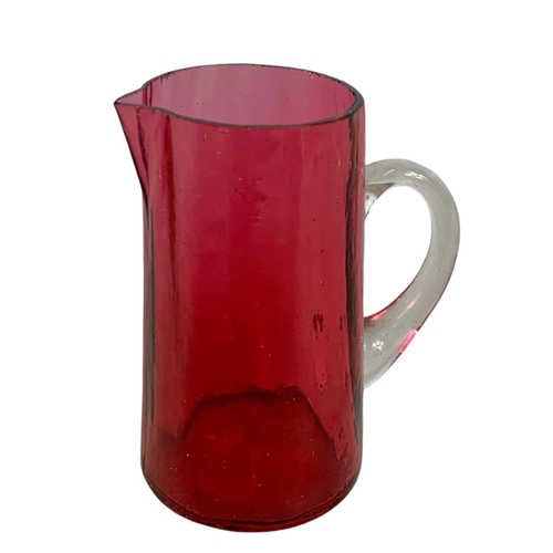 467 - 2 Victorian ruby glass jugs. 15cm