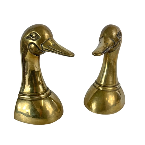 484 - Pair of vintage wooden candlesticks and a pair of brass ducks. 24cm