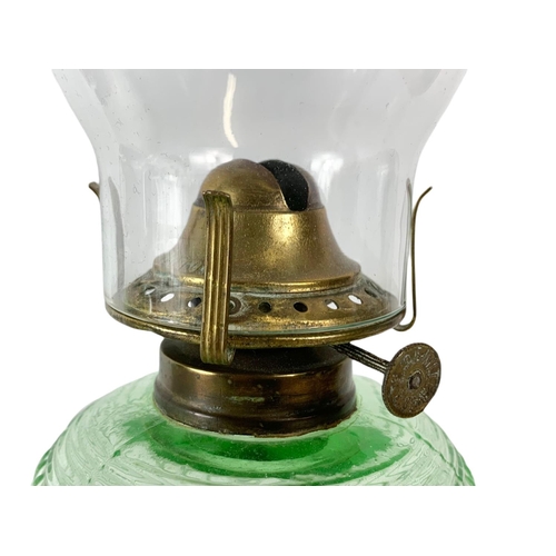 53 - Pair of Edwardian glass oil lamps. 39.5cm