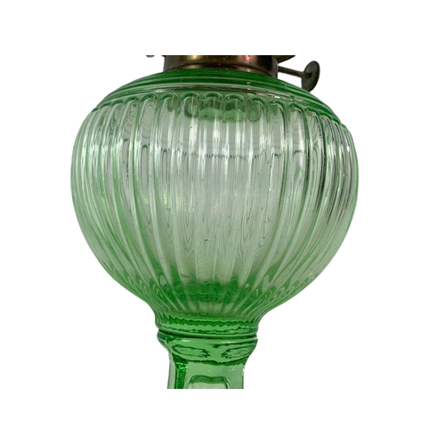 53 - Pair of Edwardian glass oil lamps. 39.5cm