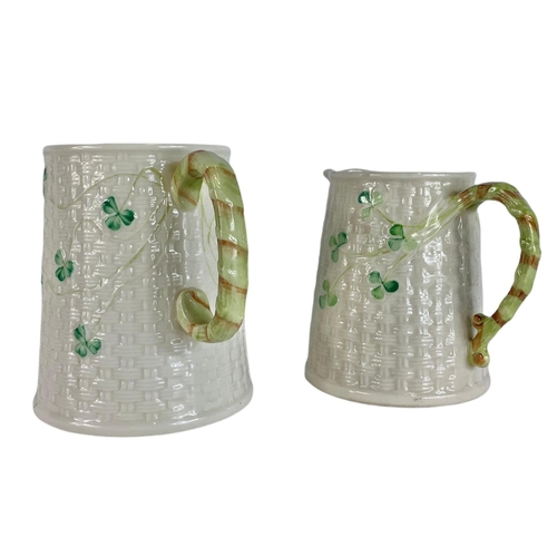 548 - Belleek pottery beer mug and jug. 12cm