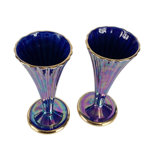 552 - Pair of ornate lustre pottery trumpet vases. 21cm