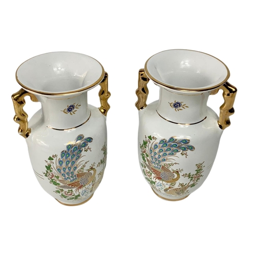 553 - Pair of Greek hand made pottery vases with 24k gold. By SD. 20cm