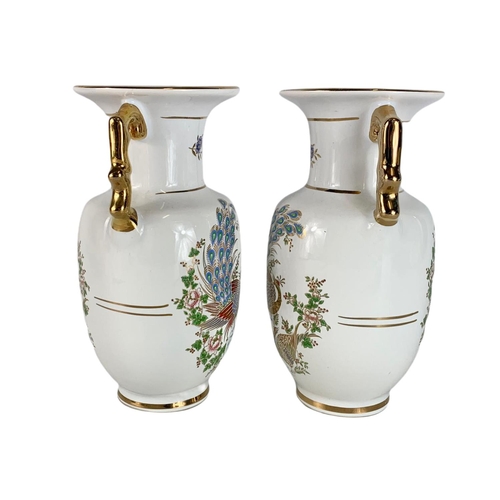 553 - Pair of Greek hand made pottery vases with 24k gold. By SD. 20cm