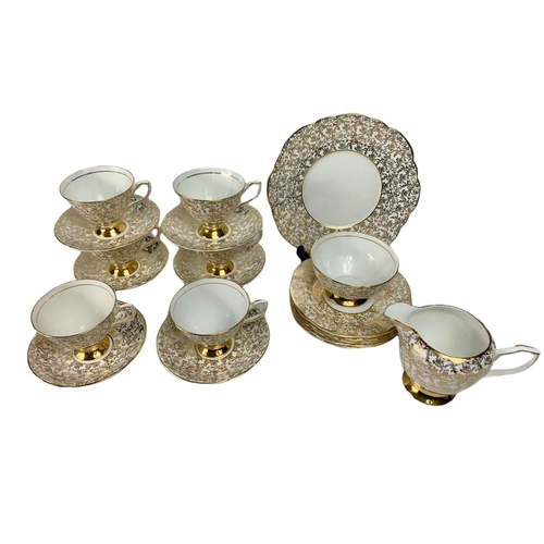 560 - 21 piece vintage Clare tea set