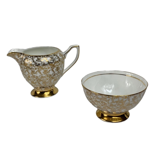 560 - 21 piece vintage Clare tea set