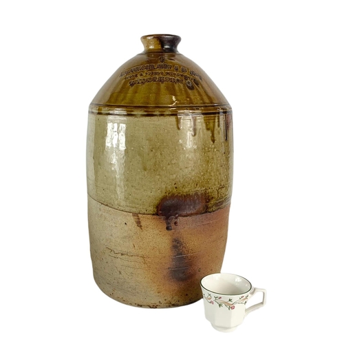 63 - Large early 20th century stoneware flagon. 49cm