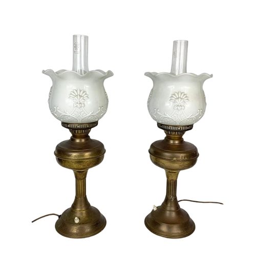 64 - Pair of large vintage oil lamps, electrified. 56.5cm