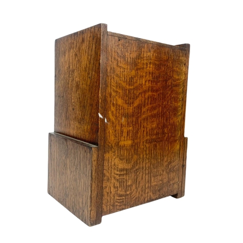 67 - 1920’s oak smokers cabinet. With pottery humidor. 20.5/16/28cm