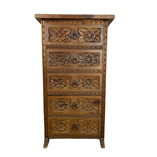 795 - Spanish carved pine 5 drawer chest.